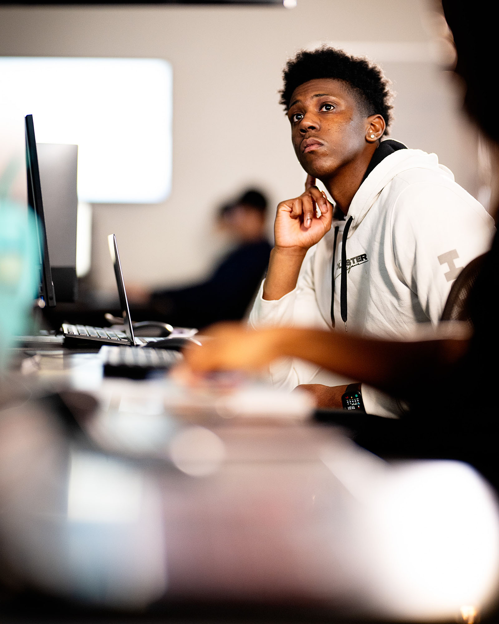 Engaged computer science student attentively listening during a lecture at East Texas A&M University.