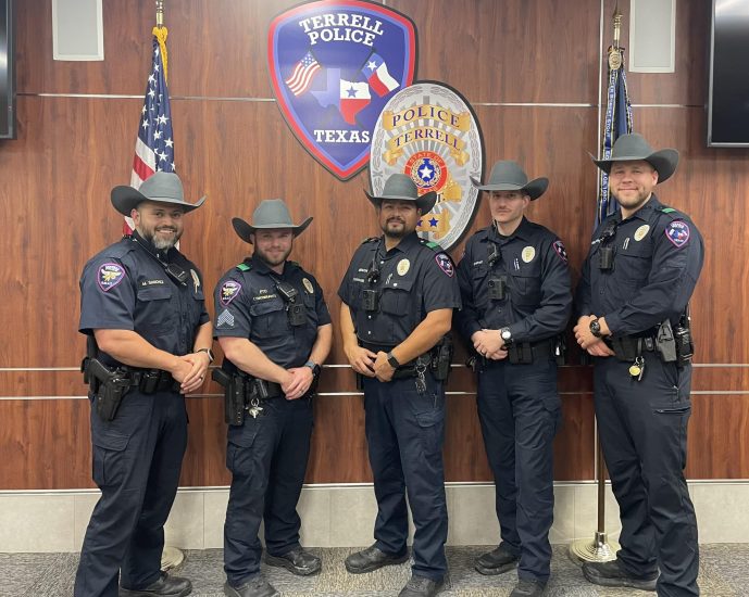 Five male officers representing the Terrell Police Department