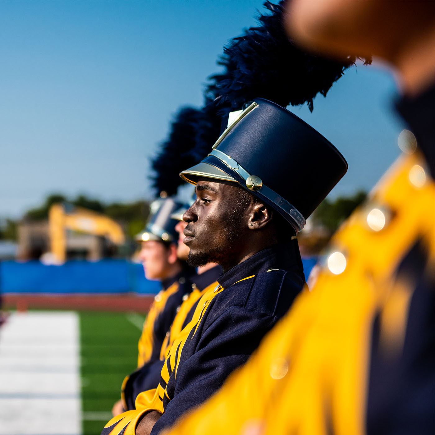 A&M-Commerce band on football field.