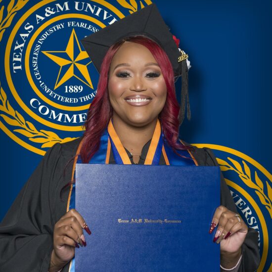 A headshot photo of a college graduate in cap and gown