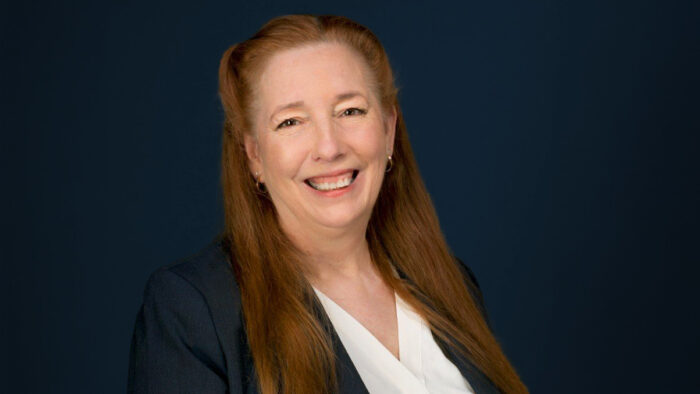 Dr. Nancy Albers smiles in her headshot photo.